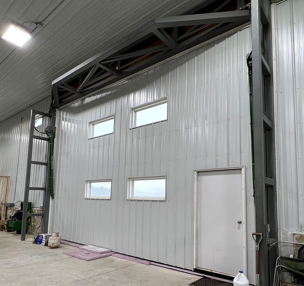 Arkansas Door by Schweiss with a Double Top and Side Truss Freestanding Self Supporting Header Framework