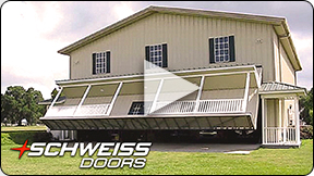 Hangar Home Porch with Unique Schweiss Hydraulic Door