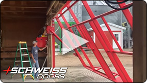 Chad Hoese opening Schweiss hydraulic door on farm