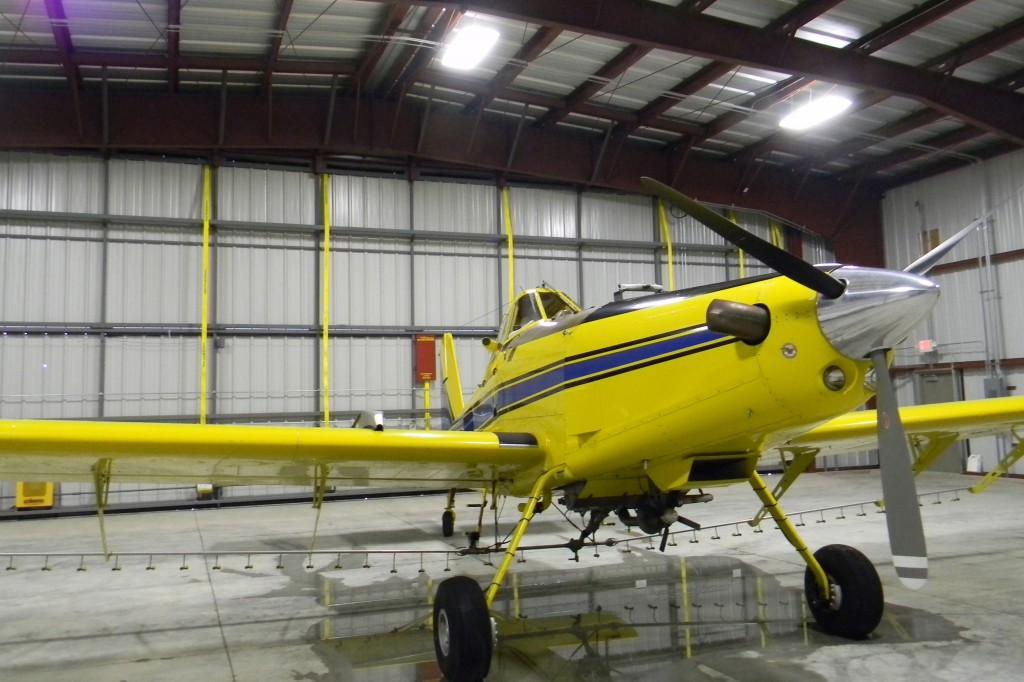 Reloading an Air Tractor with product only takes a few minutes. His hangar has two Schweiss Bifold doors at each end to go in and out of.