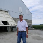 Grain storage hydraulic doors work as bunker walls for corn storage with zero leakage.