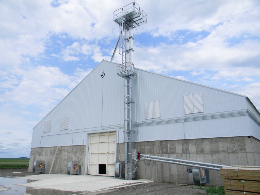 Schweiss feedlot grain storage bunker doors are built with heavy steel framework.