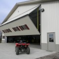 Farmers and ranchers rely on Schweiss doors for machine sheds to store large machinery.