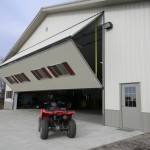 Farmers and ranchers rely on Schweiss doors for machine sheds to store large machinery.