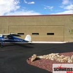 Arizona stucco clad aircraft hydraulic hangar door