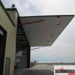 Hydraulic hangar doors