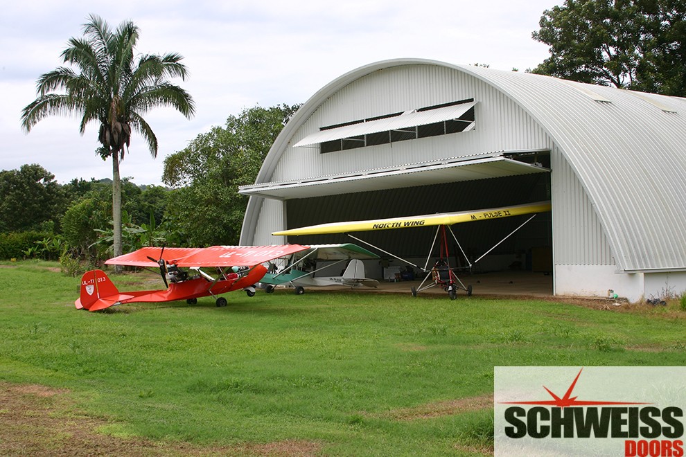 Bifold doors for hangars across the globe