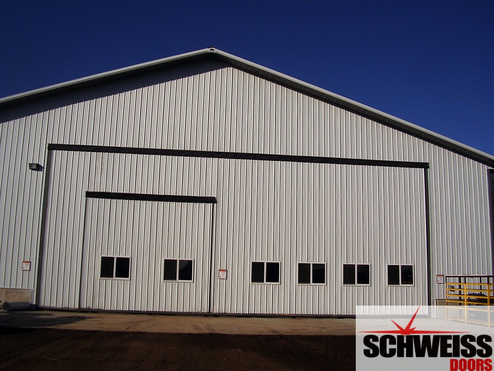 Schweiss Hydraulic doors are labeled inside and out for safety