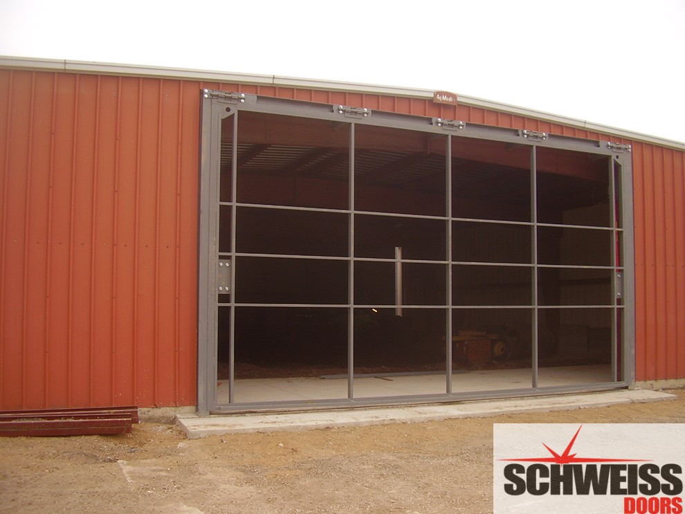 Schweiss Hydraulic doors for agriculture, marina and storage sheds